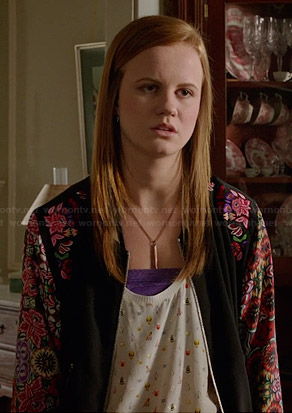 Norrie's bug print tank top and floral bomber jacket on Under the Dome