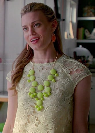Paige's yellow lace top and lime green statement necklace on Royal Pains