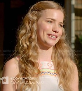 Emma's white neon printed top with pleated back on Royal Pains