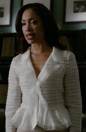 Jessica's white ruffled jacket on Suits