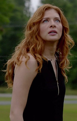Julia's black zip front top on Under the Dome