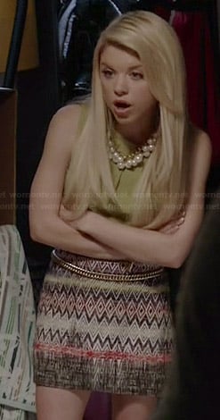 Lauren's green sleeveless top and diamond printed skirt on Faking It