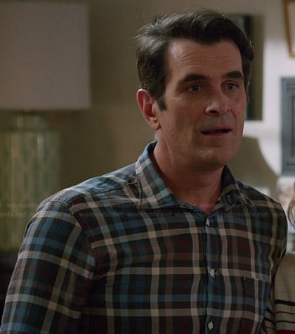 Phil's blue and brown check shirt on Modern Family