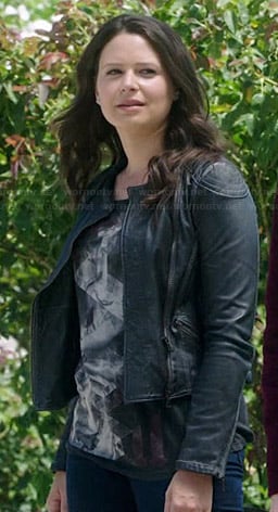 Quinn's black graphic top and leather jacket on Scandal