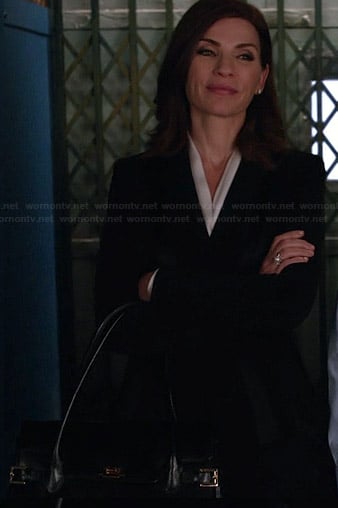 Alicia's black handbag with buckles on The Good Wife