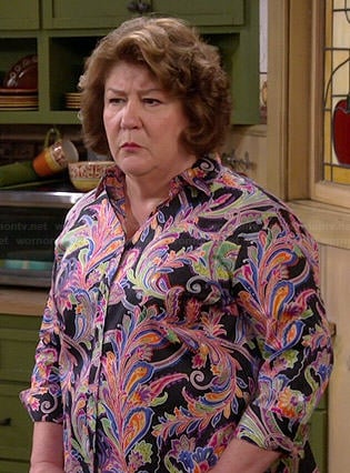 Carol's multi-colored paisley shirt on The Millers