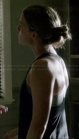 Emily's black workout tank with white back strap on Revenge