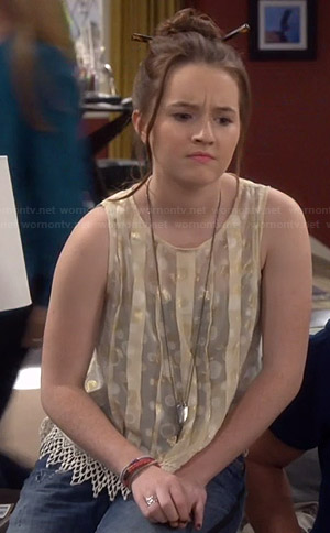 Eve's gold pleated polka dot top on Last Man Standing