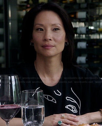 Joan's black and white face embroidered dress on Elementary