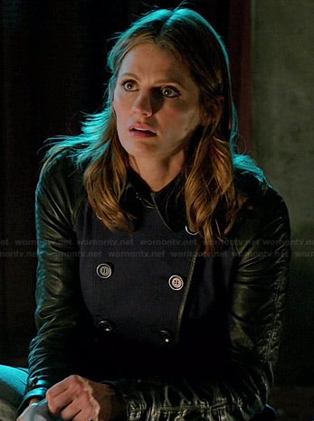 Kate's navy trench coat with black leather sleeves on Castle