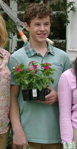 Luke's green polo shirt with plaid collar on Modern Family