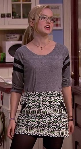 Maddie's grey varsity tee and green printed mini skirt on Liv and Maddie