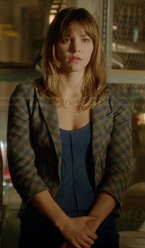 Paige's checked blazer with leather elbow patches on Scorpion