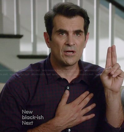 Phil's red and navy checked shirt on Modern Family