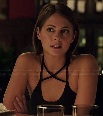 Thea's black cross strap tank top on Arrow