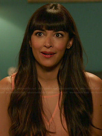 Cece's coral top with mesh triangle inset on New Girl