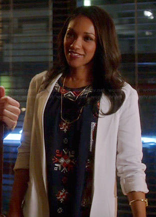 Iris's navy blue embroidered front top on The Flash