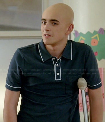 Leo's navy polo tee with white trim on Red Band Society