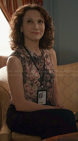 Nadine's sleeveless rose print blouse on Madam Secretary