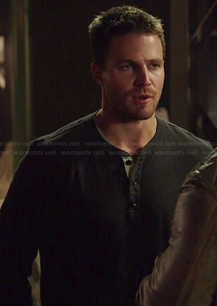 Oliver's black henley tee with white trim on Arrow