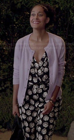 Rainbow's black printed jumpsuit and purple cardigan on Black-ish