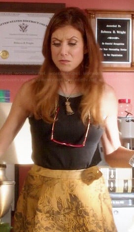 Rebecca's gold jacquard skirt and black metallic trimmed tank top on Bad Judge