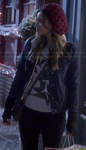 Emily's Christmas holly sweater and denim jacket on Pretty Little Liars