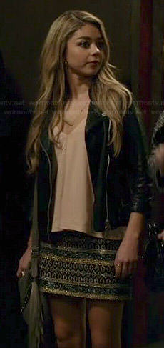 Haley's light pink camisole top and leather jacket on Modern Family