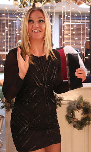 Jessica (Julia Stiles)'s black long sleeved sequin mini dress on The Mindy Project