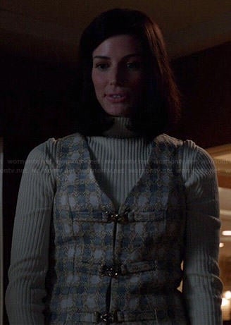 Megan's polka dot buckle-front dress and ribbed turtleneck on Mad Men