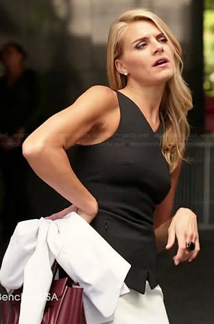 Nina's black asymmetric v-neck peplum top and white skirt on Benched