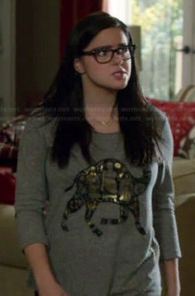 Alex's camel top on Modern Family