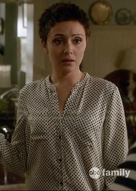 April's white polka dot blouse on Chasing Life