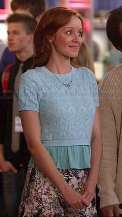 Cassandra's blue pointelle crop top and floral cat print shorts on The Librarians