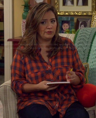 Cristela's orange plaid shirt with lace up shoulders on Cristela