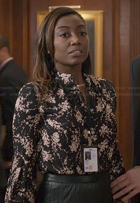 Daisy's black and white floral top and pleated leather skirt on Madam Secretary