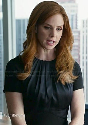 Donna's black short sleeved dress with gathered neck on Suits