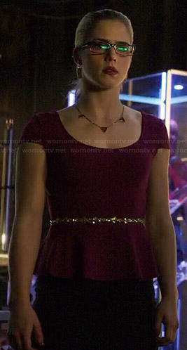 Felicity's purple peplum top and gold skinny belt on Arrow