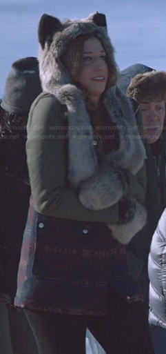 Gina's printed coat with green sleeves and fur hat on Brooklyn Nine-Nine
