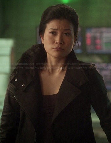 Happy's black leather sleeved jacket on Scorpion