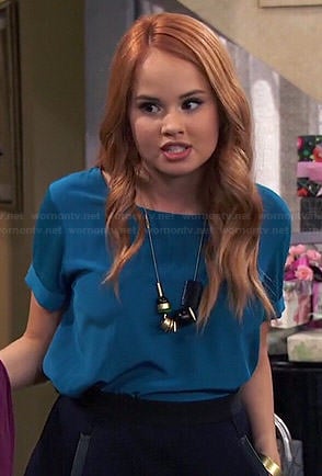 Jessie's teal blue top and a-line skirt with pockets on Jessie
