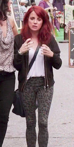 Jo's grey leopard print leggings and black jacket on Girlfriends Guide to Divorce