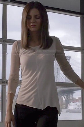 Lindy's white top with beige ribbed sleeves on Eye Candy