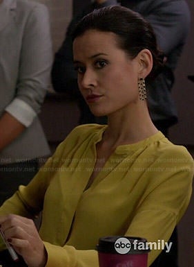 Raquel's yellow split-neck blouse on Chasing Life