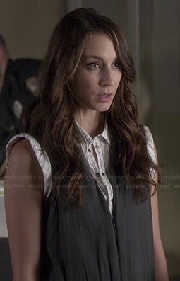 Spencer's navy zip front jumpsuit and striped sleeveless top on Pretty Little Liars