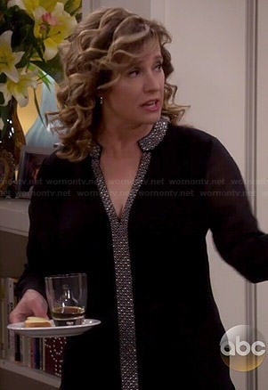 Vanessa's black blouse with printed trim on Last Man Standing