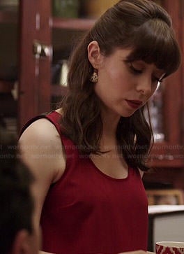 Zelda's red tank top with leather back on A to Z