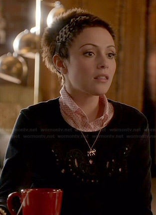 April's navy cutout sweater on Chasing Life