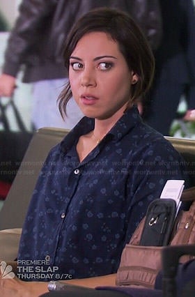 April's navy blue floral print shirt on Parks and Recreation