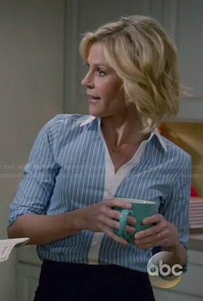 Claire's blue striped shirt with white collar on Modern Family